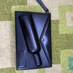 Chic Black Clutch with Bottle Design